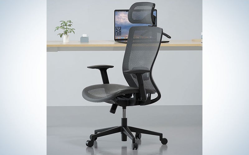 A FLEXISPOT OC3B Ergonomic Executive Mesh Office Task Chair in an office.