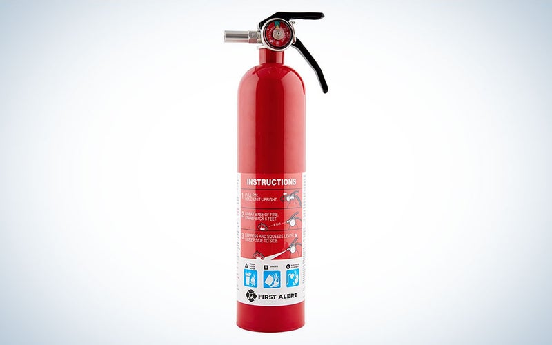 A First Alert Home1 fire extinguisher on a plain background