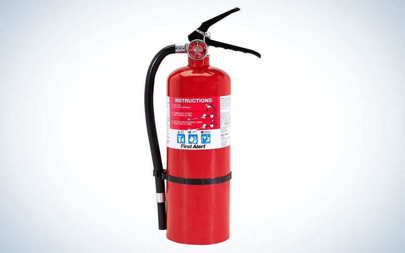 A First Alert Pro5 fire extinguisher on a plain background
