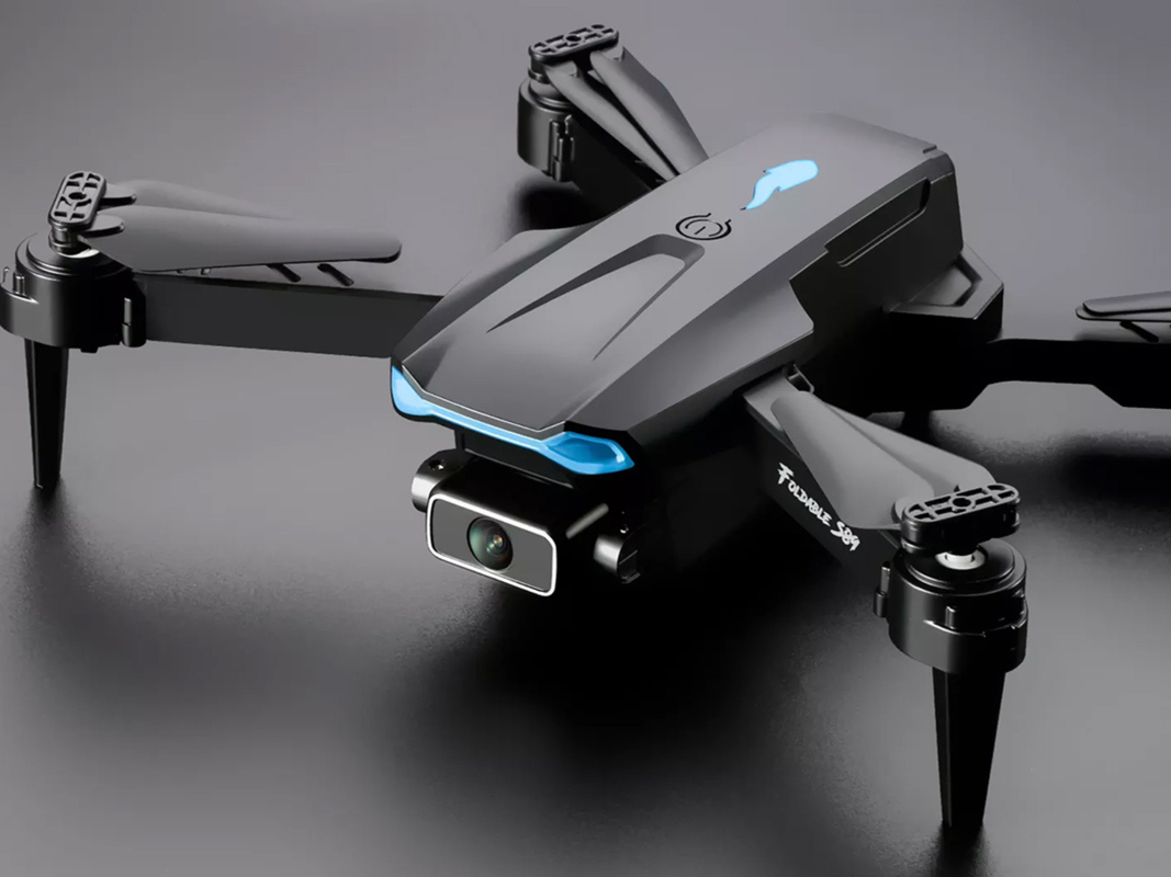 A 4K HD drone on a gray background.
