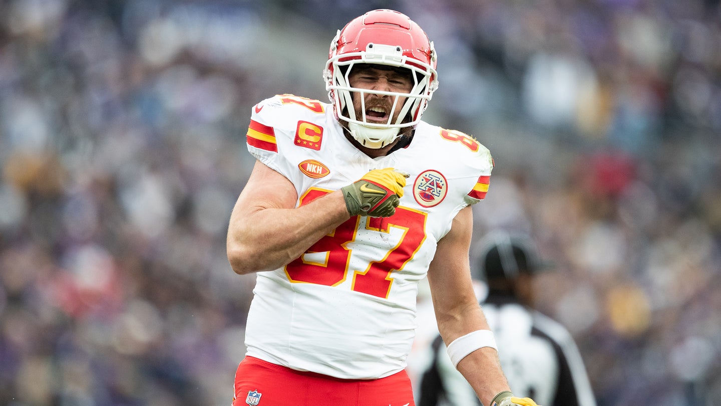 Travis Kelce #87 of the Kansas City Chiefs reacts after a play during the AFC Championship NFL football game against the Baltimore Ravens at M&T Bank Stadium on January 28, 2024 in Baltimore, Maryland.