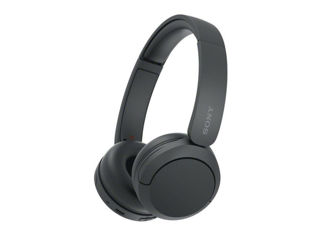 A pair of black Sony headphones on a plain background