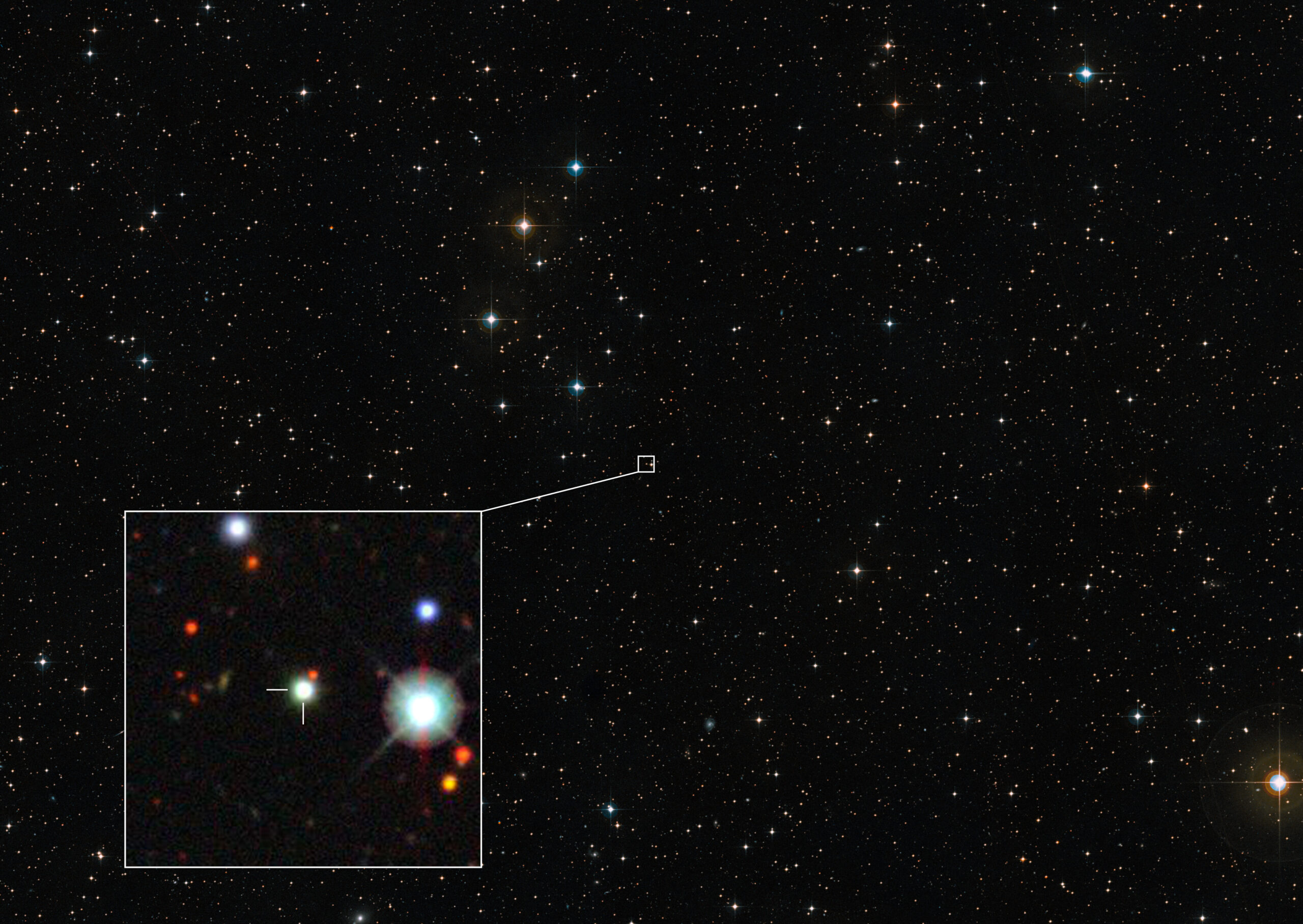 This image shows the region of the sky in which the record-breaking quasar J0529-4351 is situated. This picture was created from images forming part of the Digitized Sky Survey 2, while the inset shows the location of the quasar in an image from the Dark Energy Survey. CREDIT: ESO/Digitized Sky Survey 2/Dark Energy Survey.