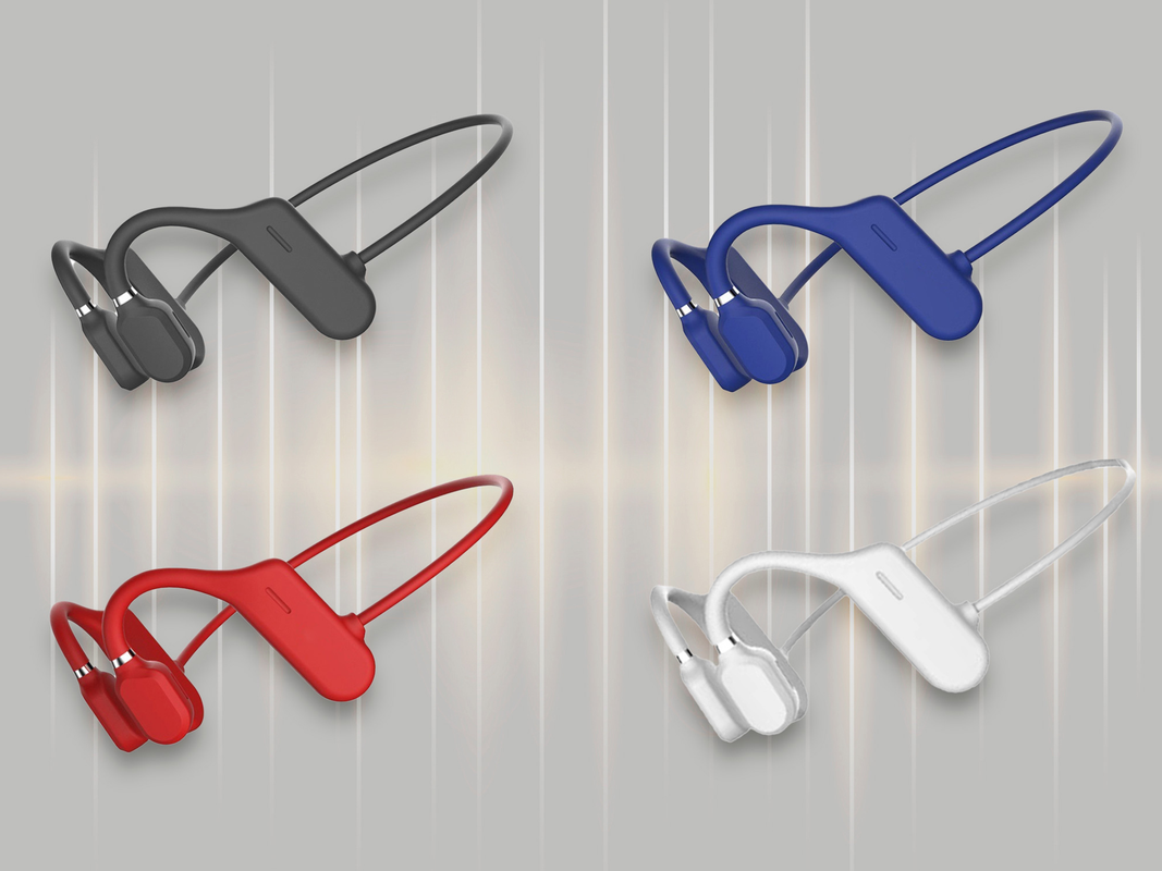 Four pairs of wireless bone conduction headphones on a grey background.