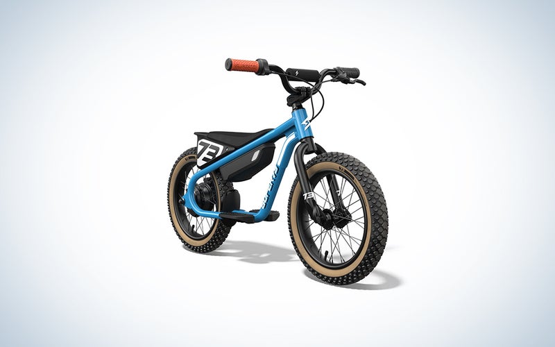 SUPER73 K1D blue motorbike-style electric balance bike for kids on a white background
