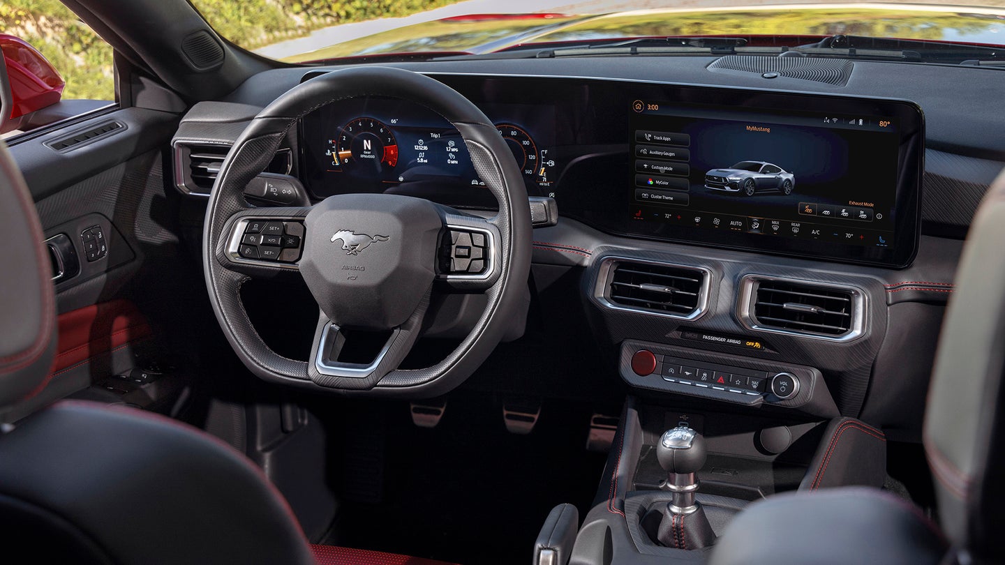 Interior of a 2024 Ford Mustang featuring a combination of buttons and screens. 