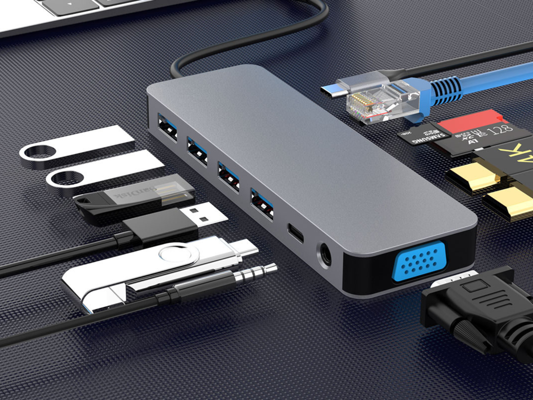 A 13-in-1 docking station with many things plugged into it.