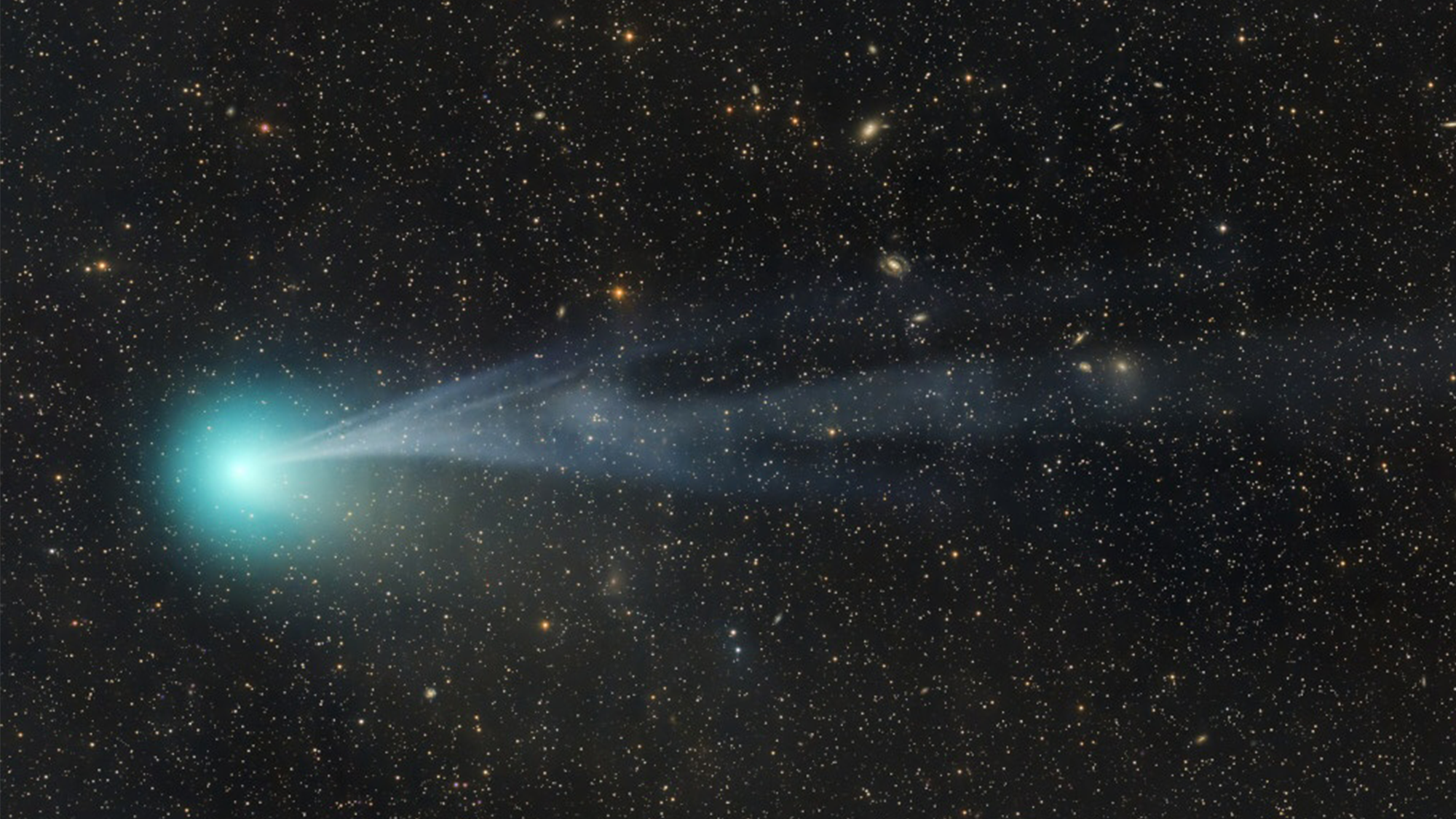 the icy white core of a comet surrounded by green dust