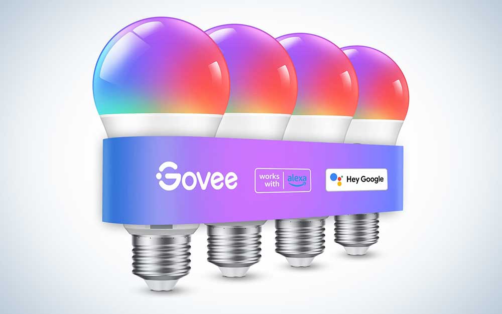 Four Govee LED smart light bulbs on a plain background