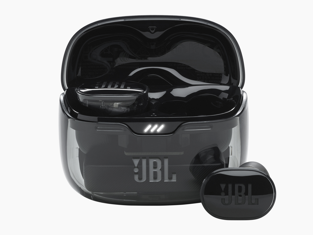 A pair of JBL headphones on a plain background.