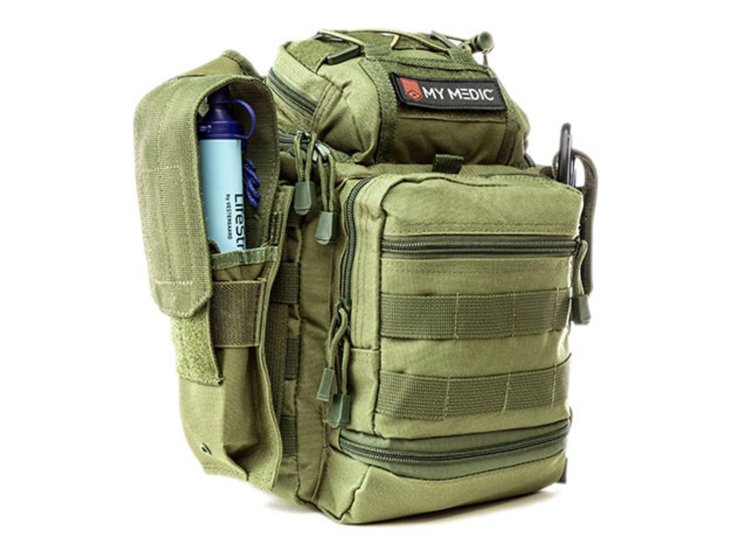 A green emergency backpack on a plain background.