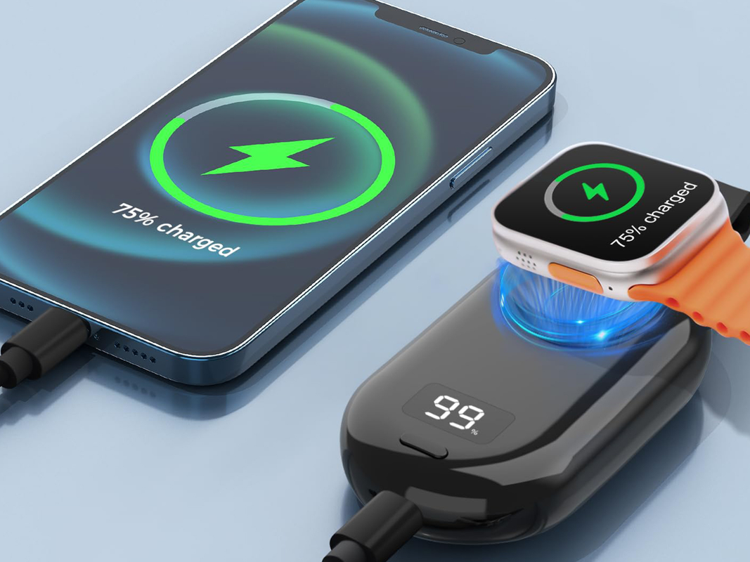 A wireless charger charging an iPhone and Apple Watch.