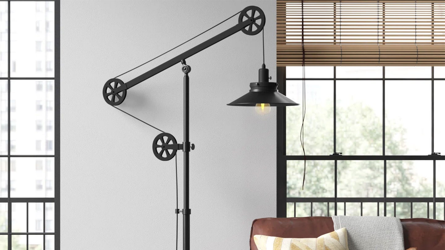 One of the best floor lamps in a room with windows. The lamp is on.