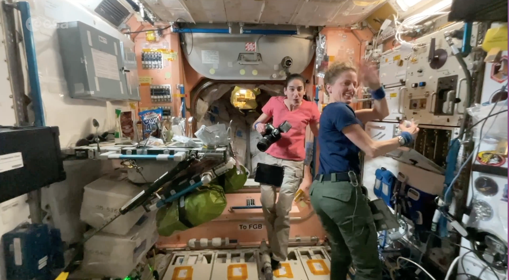 Astronauts waving in ISS