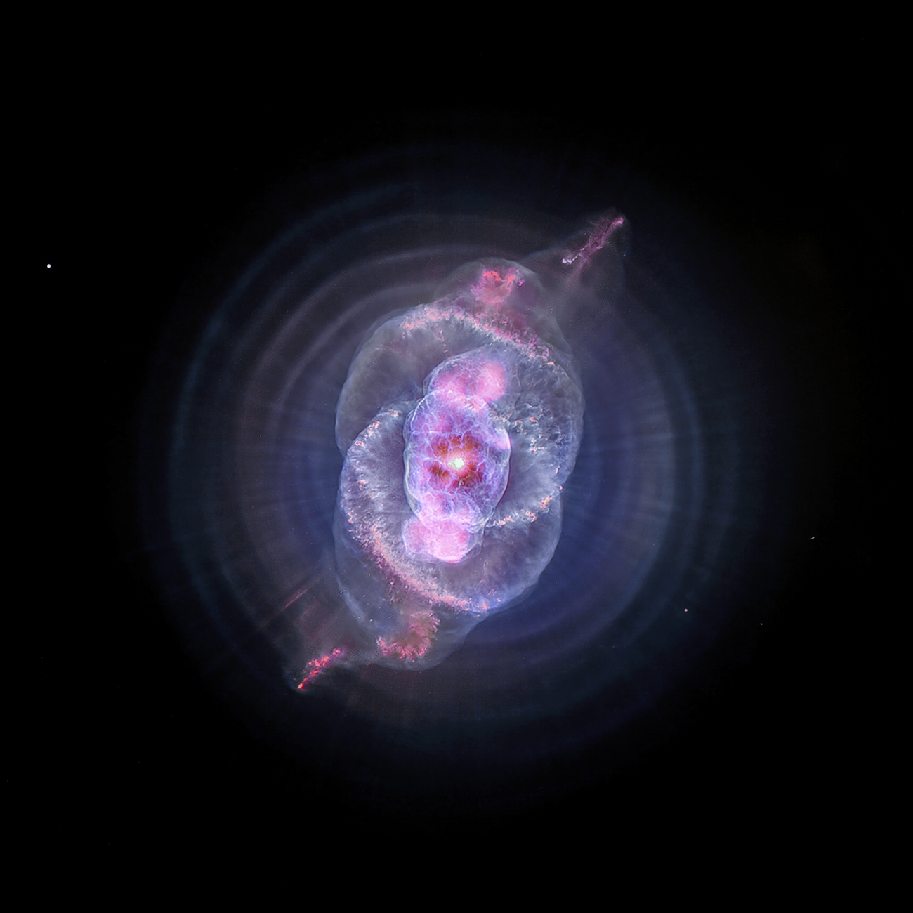 Eventually, our Sun will run out of fuel and die (though not for another 5 billion years). As it does, it will become like the object seen here, the Cat’s Eye Nebula, which is a planetary nebula. A fast wind from the remaining stellar core rams into the ejected atmosphere and pushes it outward, creating wispy structures seen in X-rays by Chandra and optical light by the Hubble Space Telescope.