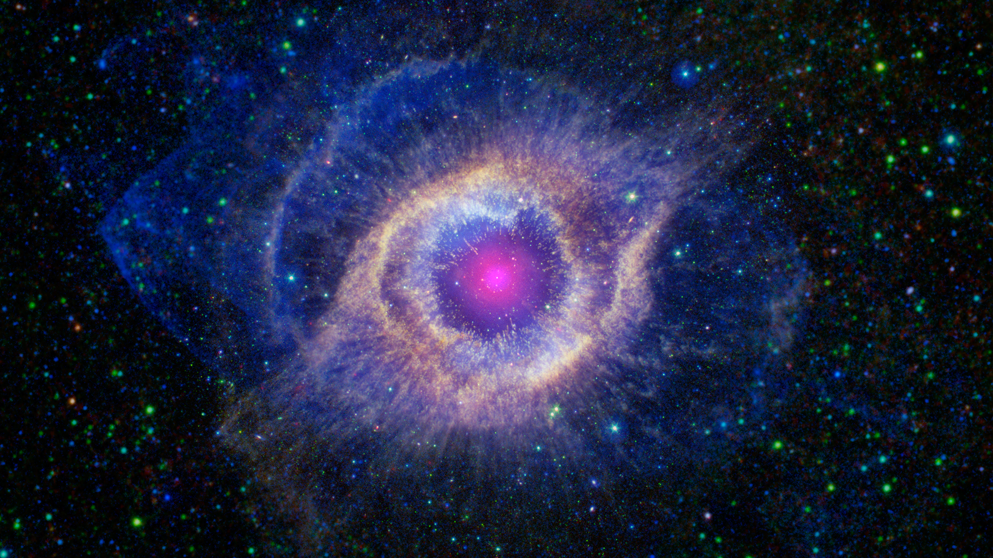 In about 5 billion years, our Sun will run out of fuel and expand, possibly engulfing Earth. These end stages of a star’s life can be utterly beautiful as is the case with this planetary nebula called the Helix Nebula. Astronomers study these objects by looking at all kinds of light, including X-rays that the Chandra X-ray Observatory sees.