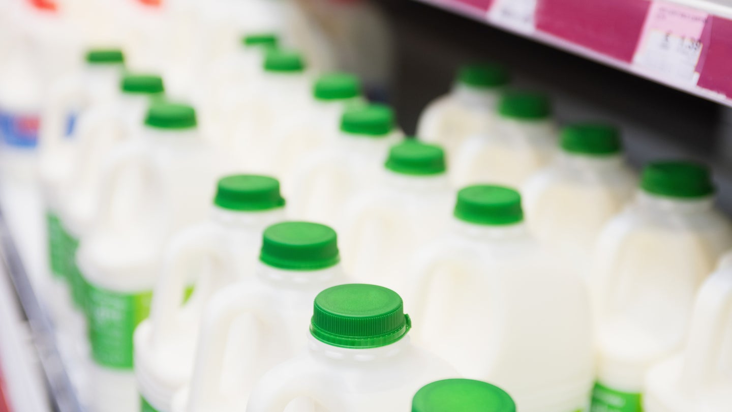 white cow's milk on a grocery store shelf