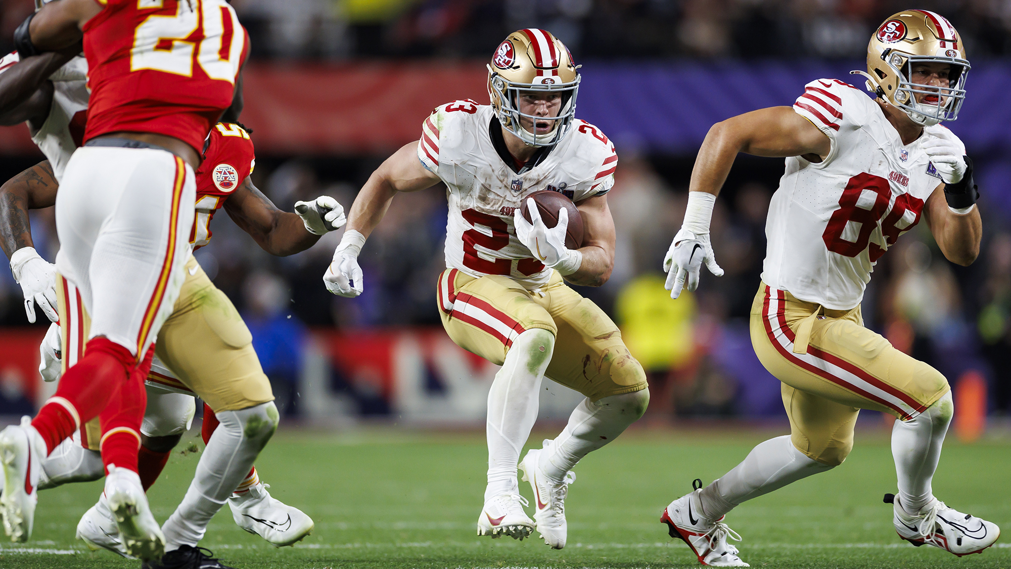 Christian McCaffrey of the San Francisco 49ers carries the football during the 2024 Super Bowl. Next Gen Stats show that McCaffrey consistently gained more yards than expected during the regular season but gained fewer in the Super Bowl, a game ultimately won by the Kansas City Chiefs.