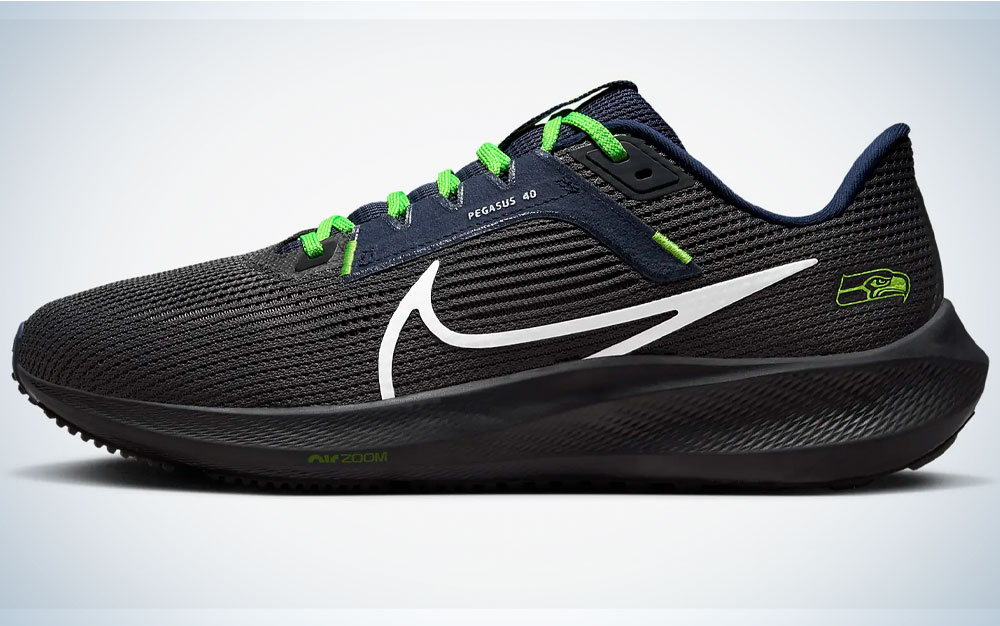 Nike Pegasus 40 sneakers with a Seattle Seahawks logo on them