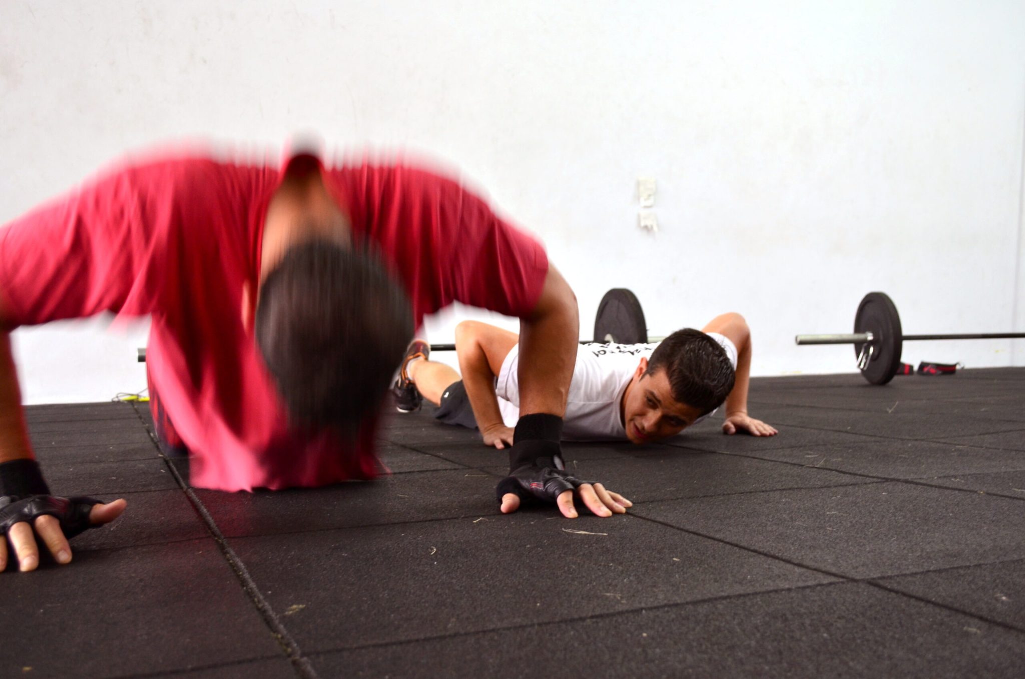 Why do my muscles ache the day after a big workout?