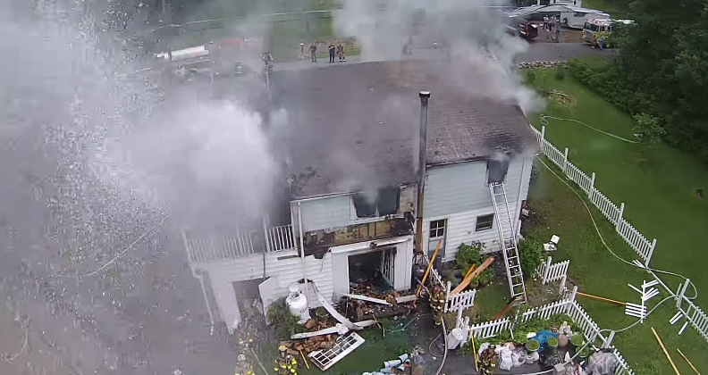 Watch A Drone Get Soaked By A Firefighter