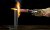A thermal lance made out of bacon cutting a steel pan in half.