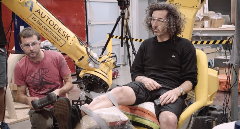 Watch A Man Get Tattooed By An Industrial Robot Arm