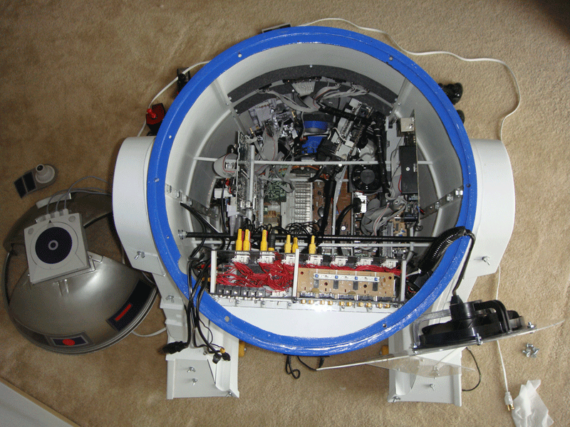 An R2-D2 cooler with video game console circuit boards inside. Top-down view.