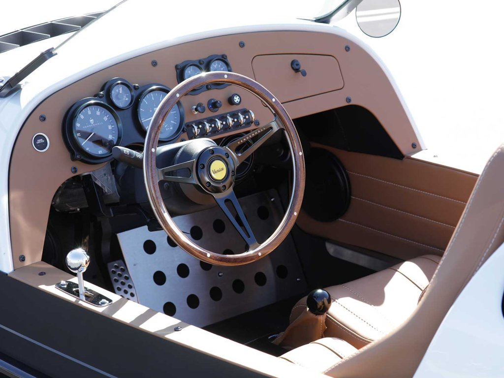 We love the not so subtle styling touches of the wood-grain steering wheel and chrome bump shifter.