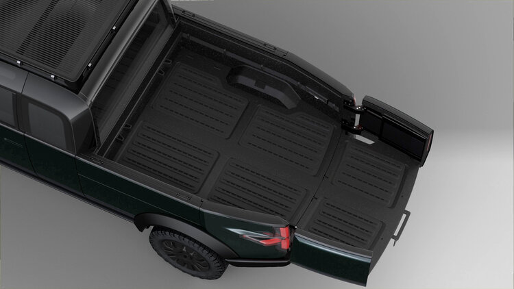 Canoo electric pickup truck with extended bed.