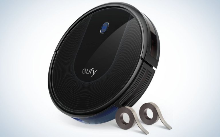 Thin, black robot vacuum cleaner for hardwood floors with boundary stripes