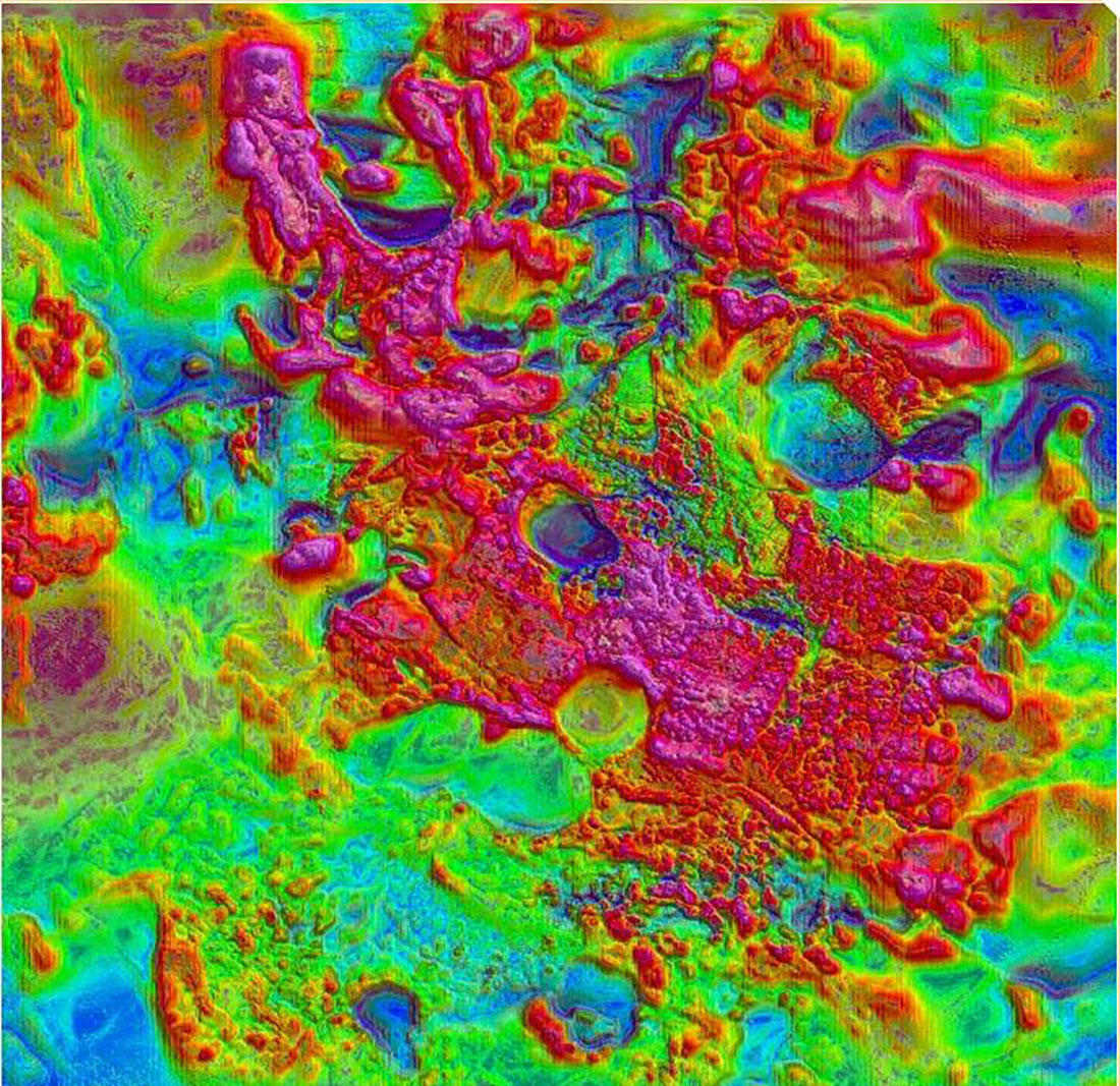 Magnetic field map of minerals in pink, blue, green, and yellow