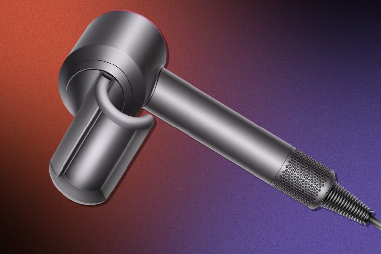 a black hairdryer with a hooked attachment