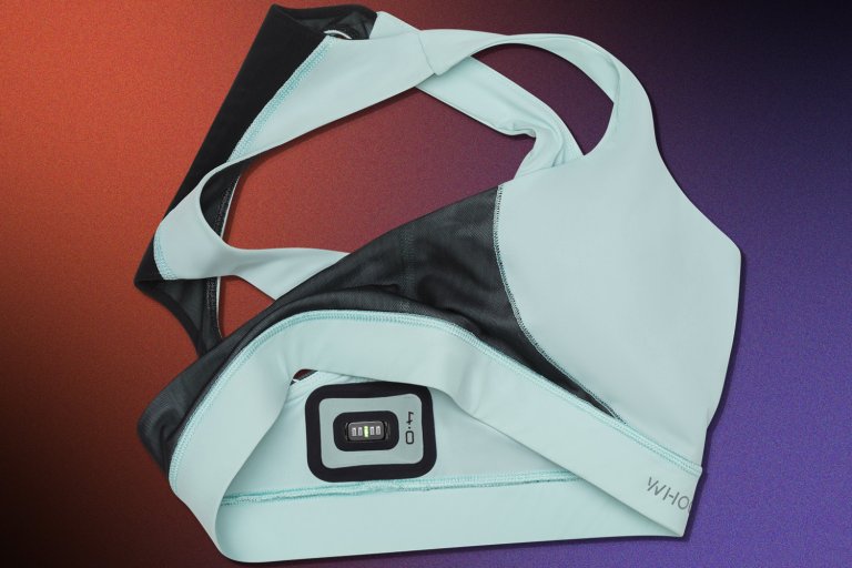 a blue sports bra with a sensor inside its band