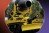 Thermite RS3 yellow firefighting vehicle on a red, black, and purple background