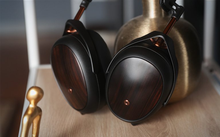 Madagascar ebony wood Meze LIRIC II closed-back planar magnetic headphones on a shelf