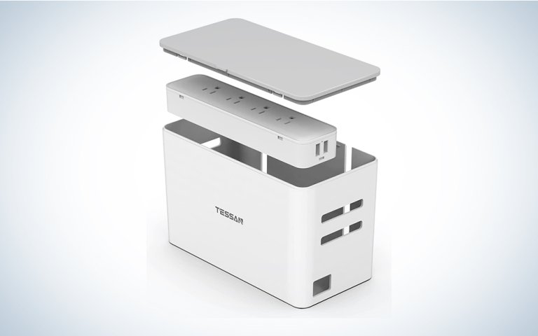 A white cable management box on a blue and white background.