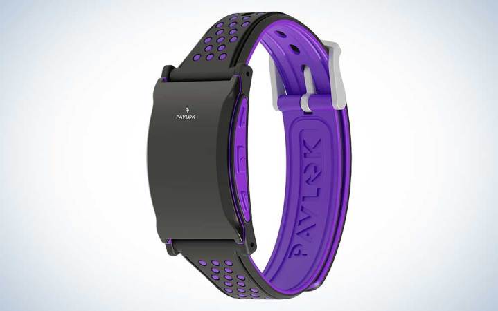  A purple and black Pavloc Shock Clock 3 alarm clock on a plain background. 