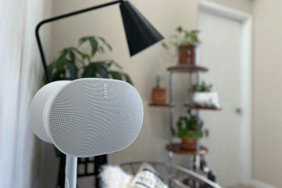 White Sonos Era 300 spatial audio speaker on matching stand