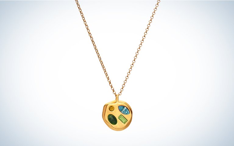 A Birthdate Pendant on a blue and white background