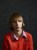 Taylor Wilson in a red sweater looking to the right of the camera