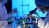 Two doctors performing lab tests, one looking into a microscope and the other using a pipette.