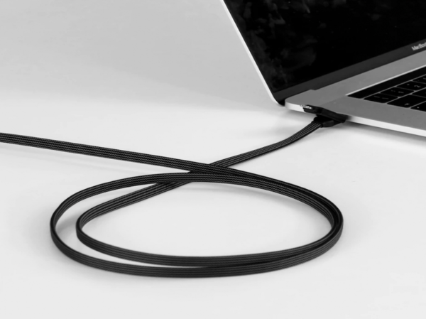 A charging cable plugged into a computer
