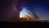 A rocket launch creates strange contrails in front of the Milky Way.