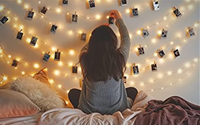 The 12APM Dimmable Fairy Lights on a white wall