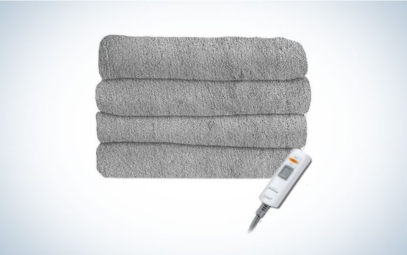 A gray Sunbeam heated blanket on a plain background
