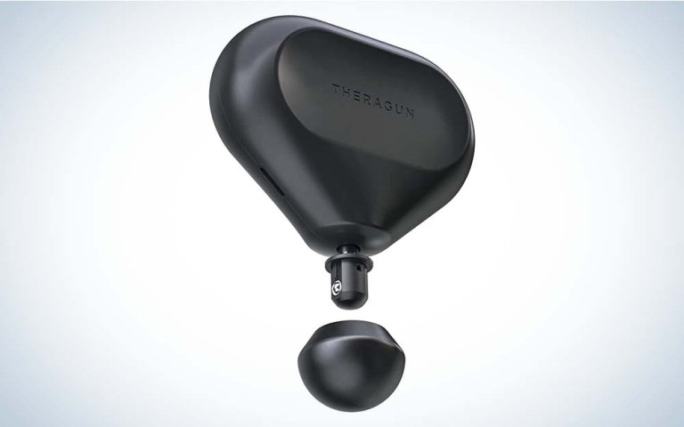 A black triangular-shaped Theragun Mini Massage Gun.