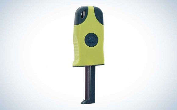 A green and blue ust Sparkie fire starter on a plain background