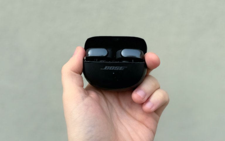 Bose Ultra Open Earbuds on a plain white background.