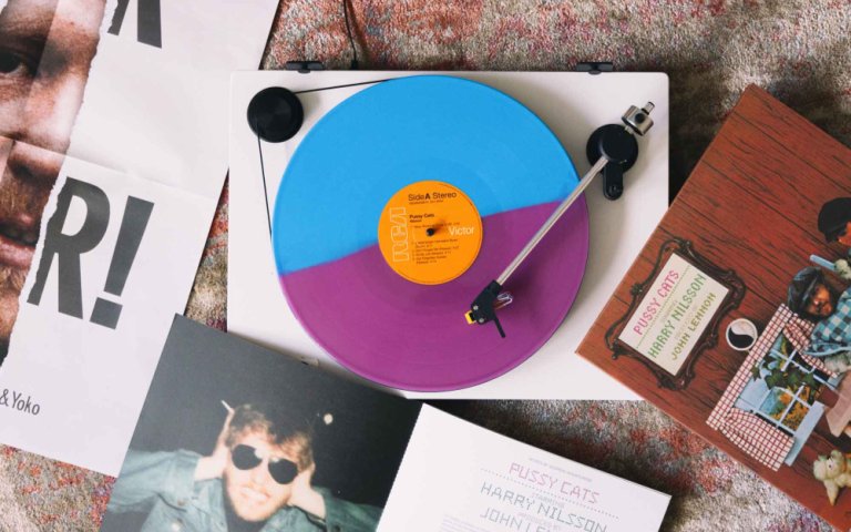 A copy of Harry Nilsson's Pussy Cats on a turntable.